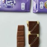 Bei Milka zieht man tatsächlich einen Riegel als Portionsgröße heran. Je nach Größe der Schokoladentafel ist die Portion dann zwischen 16,7 Gramm und 40 Gramm groß.