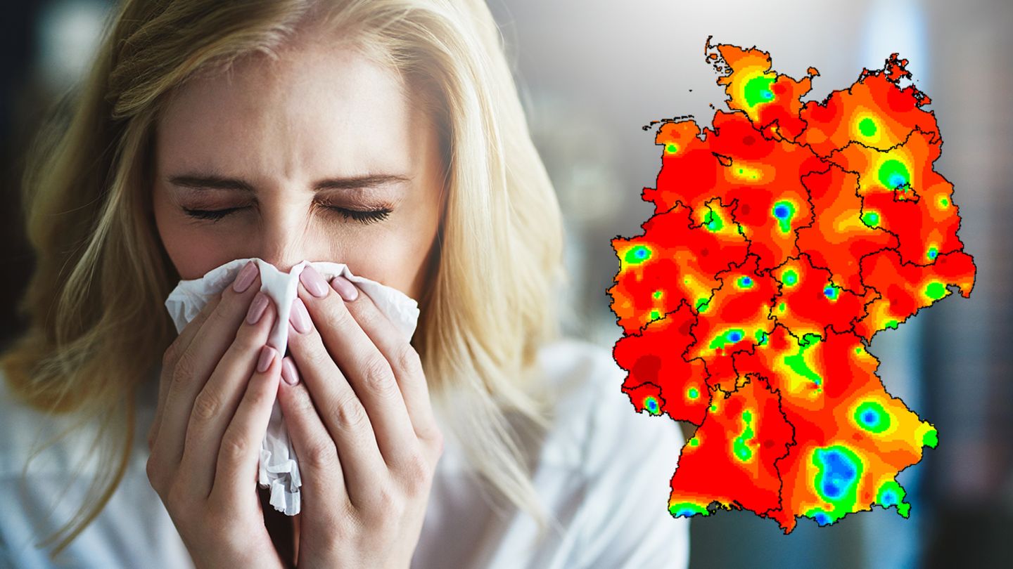 Eine Frau benutzt ein Taschentuch