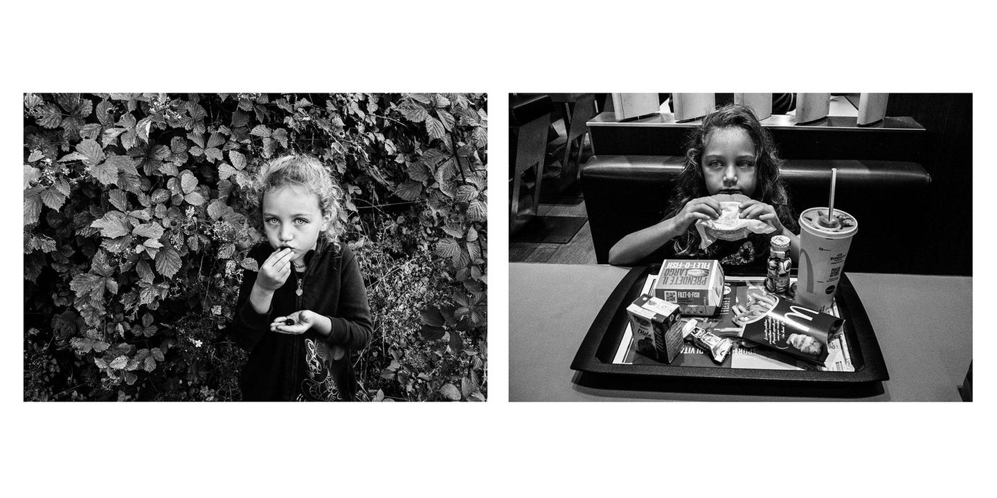 Essen Mädchen mit gesundem Essen und Fastfood