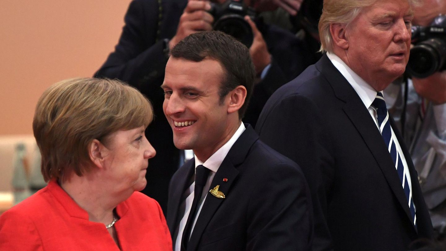 Angela Merkel, Emmanuel Macron und Donald Trump