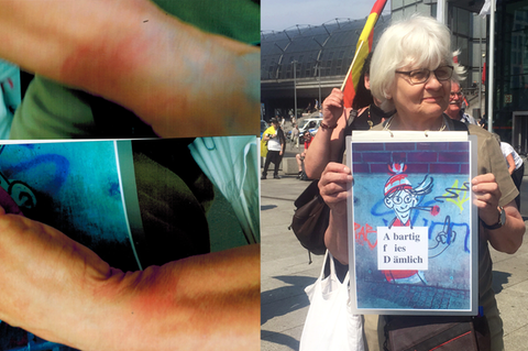 Irmela Mensah-Schramm hält ein Anti-AfD-Plakat hoch