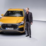 Audi Q8 zusammen mit Chefdesigner Marc Lichte