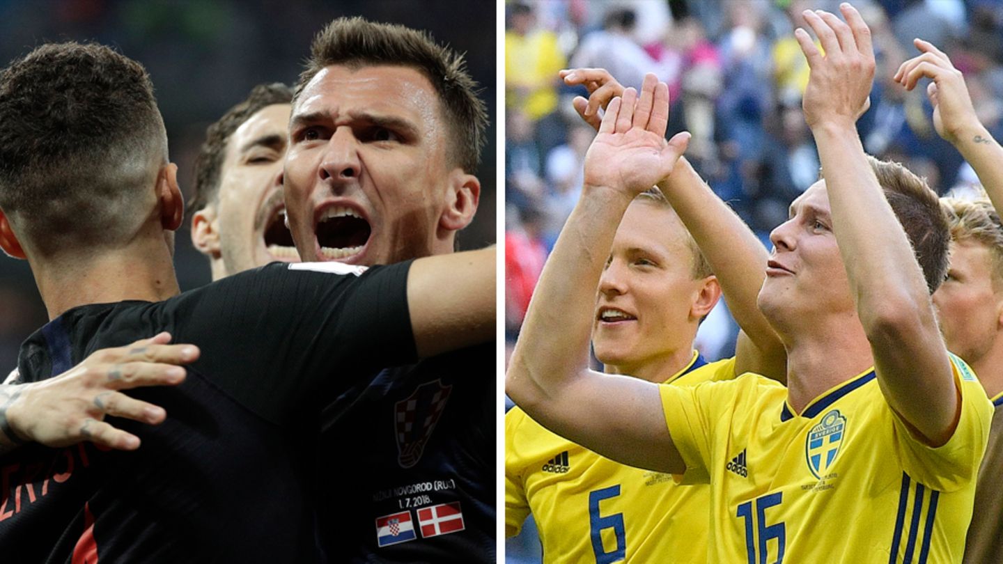 Spieler der Nationalmannschaften von Kroatien (l.) und Schweden