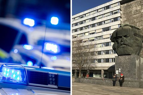 Blaulicht von mehreren Polizeifahrzeugen, das Karl-Marx-Denkmal in Chemnitz