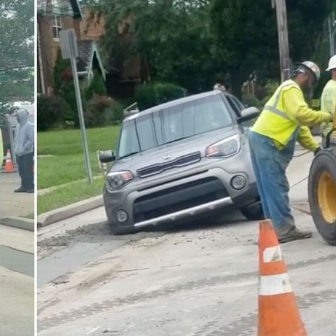 Mann fährt in frischen Beton