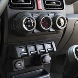 Suzuki Jimny 1.5 - Schalterquartett in der Mittelkonsole
