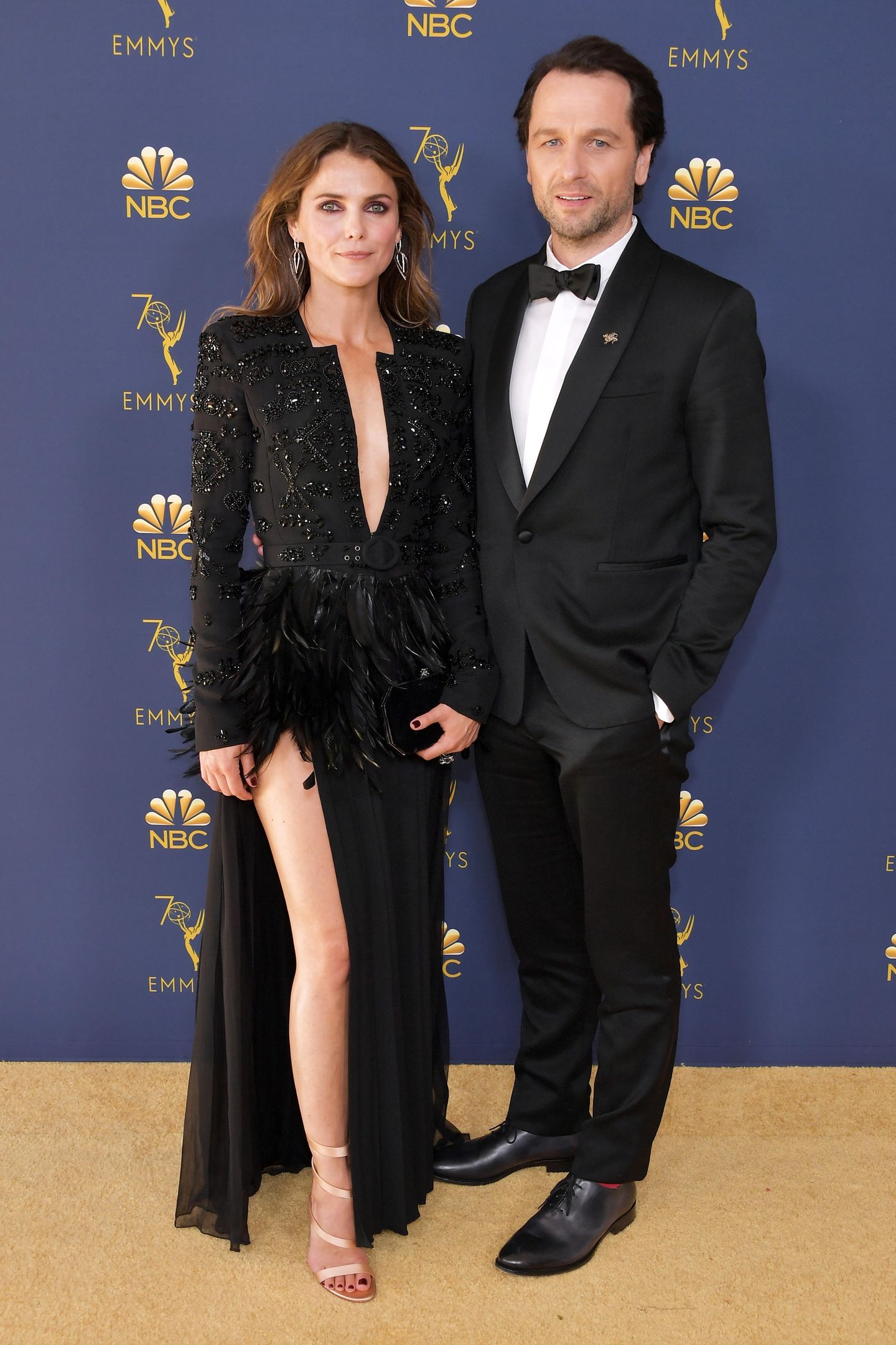 Keri Russell und Matthew Rhys lernten sich am Set der Serie "The Americans" kennen. Dort spielen sie ein russisches Spionen-Paar. Inzwischen sind sie auch im echten Leben liiert und Eltern eines Sohnes. Zu den Emmys kamen sie stilvoll im schwarzen Partnerlook.