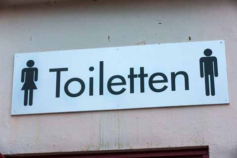 Putzmann: Schild einer öffentlichen Toilette