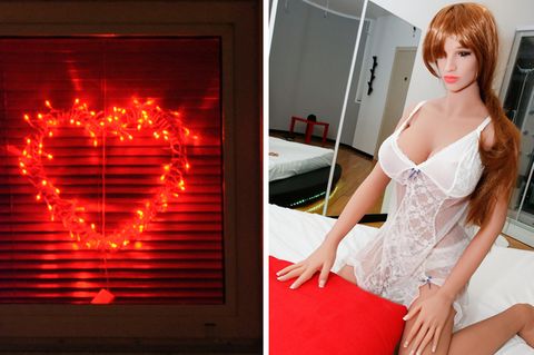 Leuchtreklame des Sexpuppen-Bordells in Freiberg, eine Sexpuppe in einem Turnier Etalblissementz
