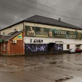 Bild 1 von 11 der Fotostrecke zum Klicken:  Ehemalige Große Synagoge und heute ein Fitness-Center in Sambir, Galizien, in der Ukraine, 2017. Das Foto ist aus dem Buch "In schwindendem Licht - Spuren jüdischen Lebens im Osten Europas" von Christian Herrmann.