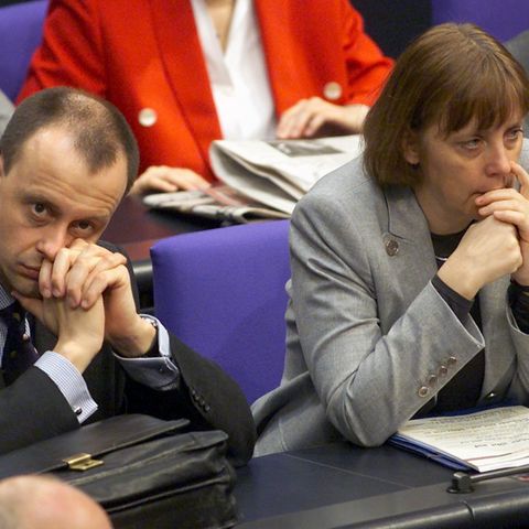 Friedrich Merz und Angela Merkel im Bundestag
