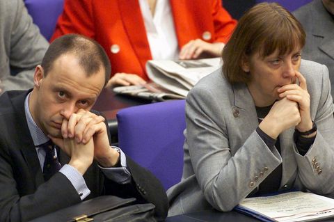 Friedrich Merz und Angela Merkel im Bundestag