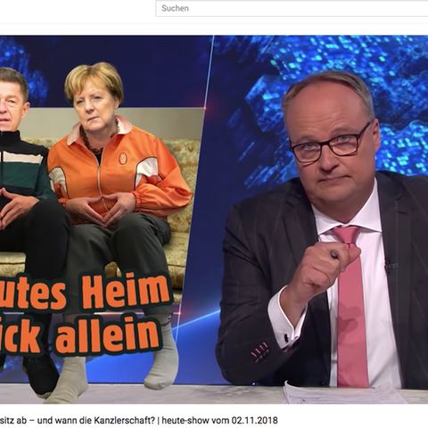 Oliver Welke und Angela Merkel