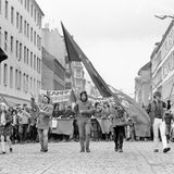 Demonstranten als Che Guevara verkleidet