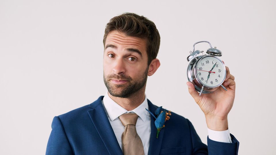 Mann mit Uhr