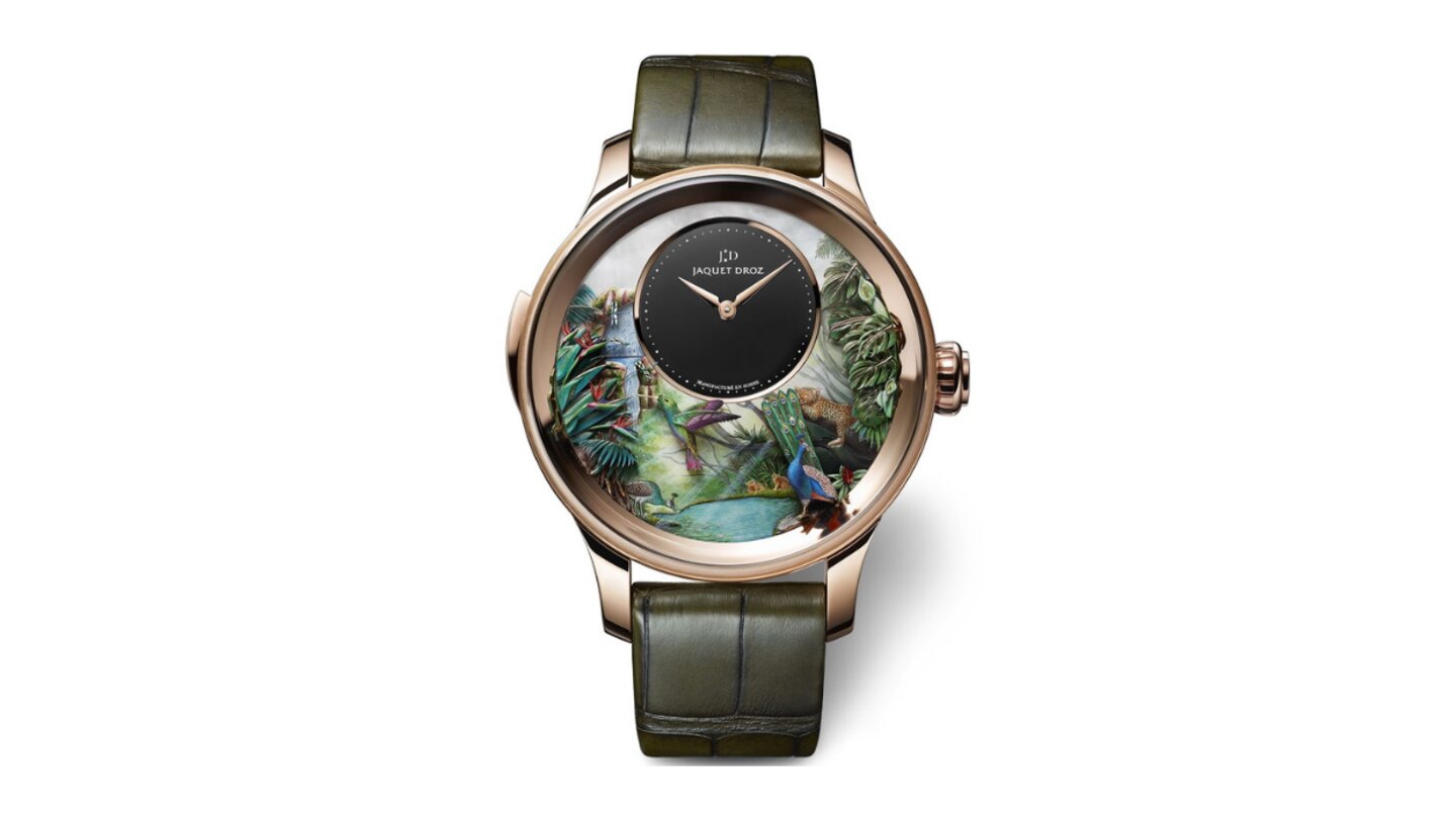 Kategorie Metiers D'Art      Gewinner: Tropical Bird Repeater von Jaquet Droz  Das Perlmuttzifferblatt - per Hand graviert und bemalt - und die Zeitanzeige aus schwarzem Onyx sowie die klangvolle Minutenrepitition sind längst nicht alles. Denn vom Pfau, der seine Schwanzfedern auffächert, über rauschende tropische Blätter bis zum fliegenden Kolibri ist dieser U(h)rwald mechanisch animiert.  Das sagt die Jury: "Sieben mechanische Animationen die bis zu zwölf Sekunden andauern und vier Szenarien bespielen - muss man mehr sagen? Eine Meisterleistung der großen Komplikation und Minutenrepetition, aufgeführt als exotisches Panoptikum, das zum Hinfort-Träumen einlädt."  Basisdaten (Auszug): Rotgold (Gehäuse), 47mm Durchmesser, wasserdicht bis 0m, 60 Stunden Gangreserve.  Preis: circa 669.400 Euro.