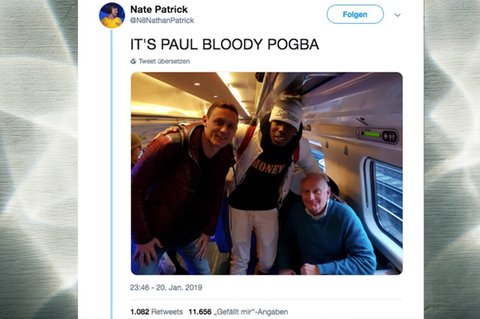 Paul Pogba und Nemanja Matic mit dem Vater von Nate im Zug