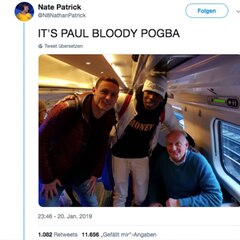 Paul Pogba und Nemanja Matic mit dem Vater von Nate im Zug