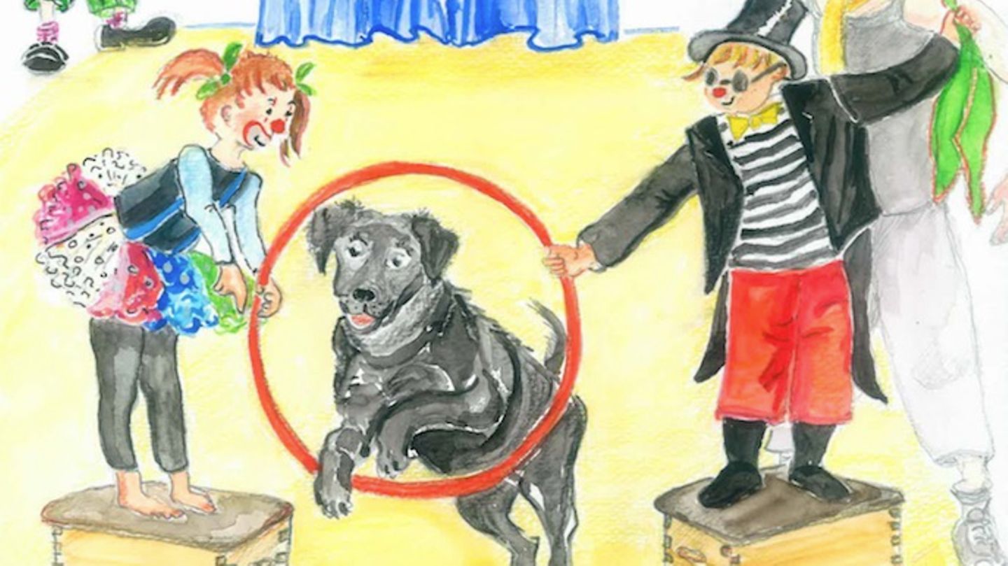 Blindenhund Watson springt durch einen Reifen