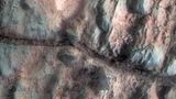 "Opportunity" fotografierte nicht nur die Mars-Landschaft, sondern drang mit Instrumenten auch in die Gesteinsschichten vor. 