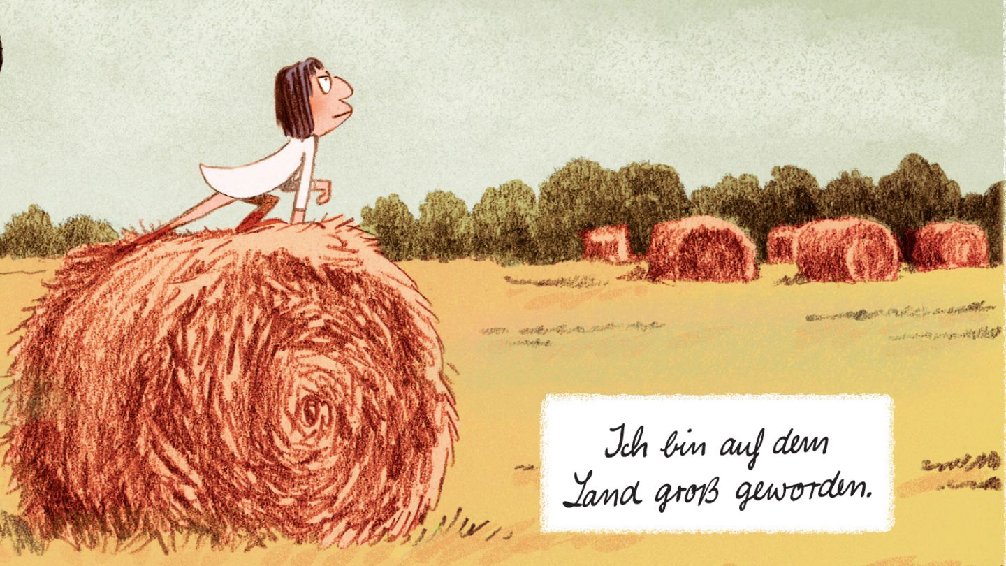 Klein Catherine kniet stolz af einem Heuballen