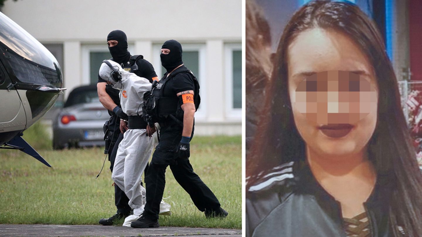 In Wiesbaden wird Ali B. von Polizisten aus dem Justizzentrum zu einem Polizeihubschrauber gebracht