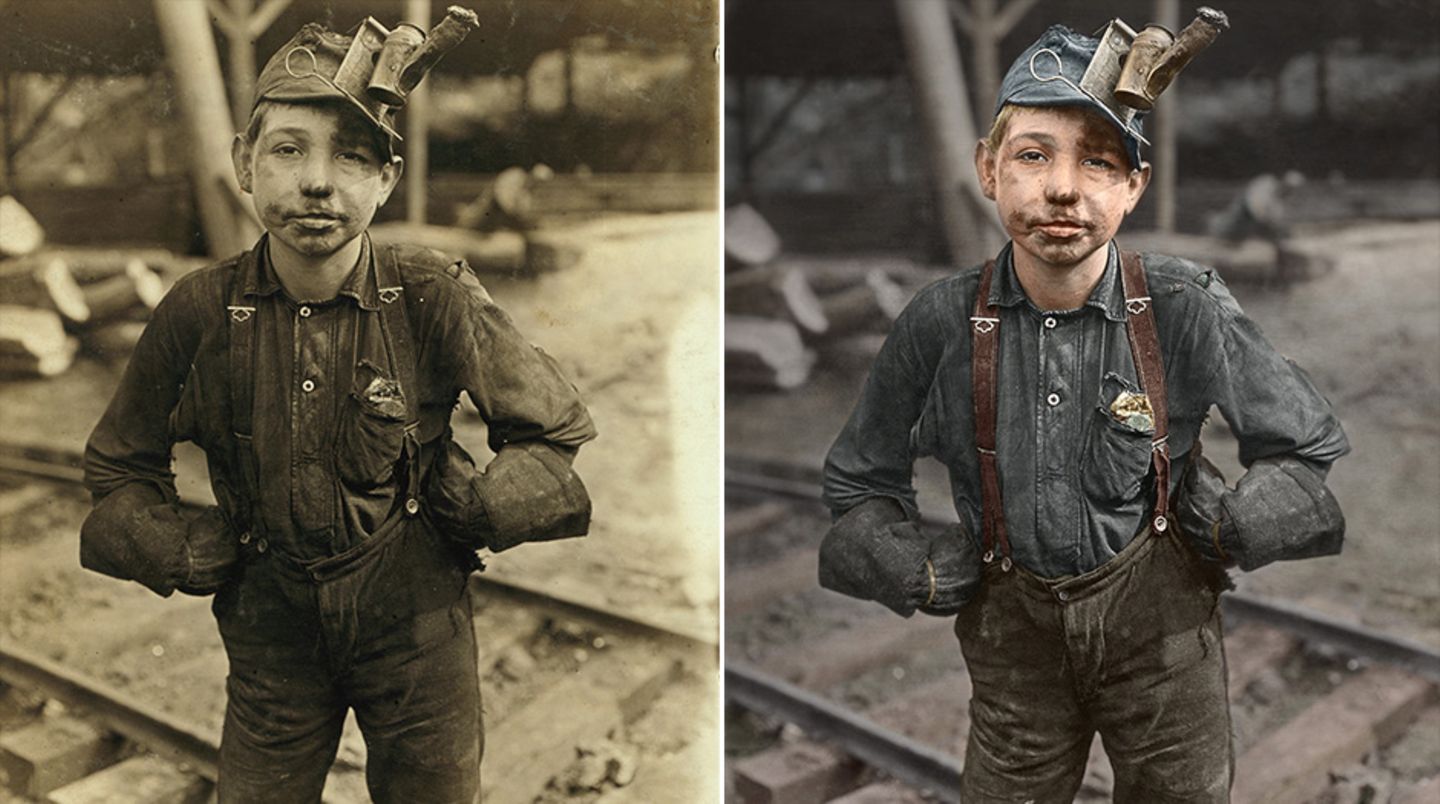 Ein kleiner Junge mit Kohlenstaub im Gesicht