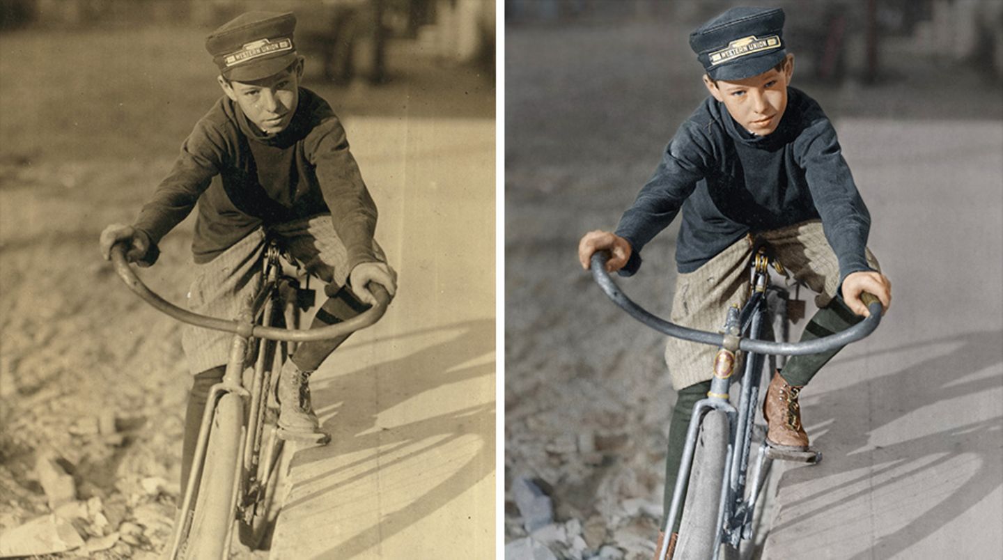 Ein Junge mit Western-Union-Mütze auf einem Fahrrad