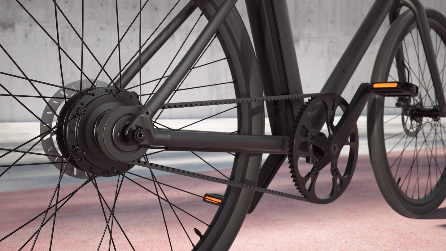 Cooles E-Bike aus Belgien: Die Unterbrechung des Rahmens wegen des Riemens sitzt unsichtbar in der oberen Strebe. Die Unterbrechung des Rahmens wegen des Riemens sitzt unsichtbar in der oberen Strebe.