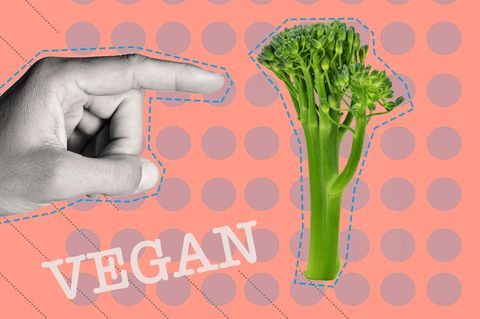 Ein Finger der auf einen Brokkoli zeigt