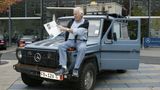 Gunther Holtorf mit seiner Mercedes G-Klasse
