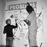 Andy Warhol und Jean-Michel Basquiat arbeiten gemeinam an einem Bild