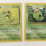 Foto von zwei Karten: links das "normale" Raupy, rechts eine spezielle Illustration