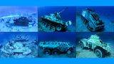 Auf dem Grund des Roten Meeres liegen mehrere militärische gepanzerte Fahrzeuge und ein Helikopter