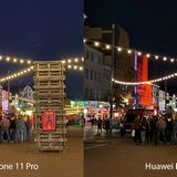 Huawei schärft seine Nachtaufnahmen generell sehr stark nach. Das sorgt einerseits für viele Details (Bretterwand im Vordergrund, beleuchtetes Haus im Hintergrund). Gleichzeitig verwaschen aber der Boden und die Klamotten der Menschen in der Mitte. Insgesamt ein Unentschieden.