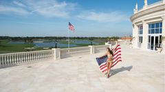Bild 1 von 10 der Fotostrecke zum Klicken:   Foto-Shooting auf der Hotelterrasse des Trump National Doral: Nia Sanchez, die Miss USA 2014, zeigt sich mit Sternenbanner.