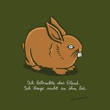 Ein brauner Hase. Darunter steht: "Ich betrachte das Elend. Ich trage nicht zu ihm bei."
