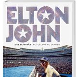 Cover mit Elton John, der in einem ausverkauften Stadion Flügel spielt