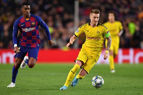 Barcelonas Junior Firpo (l.) und Dortmunds Marco Reus kämpfen in der Champions League um den Ball