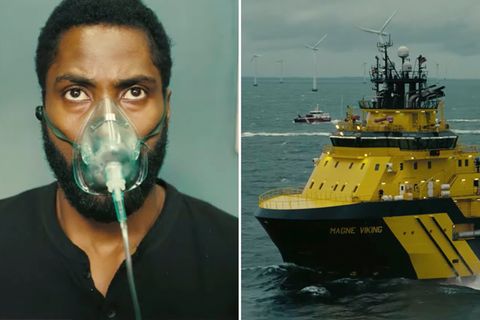 John David Washington mit Atemmaske und gelbes Militärboot auf der rechten Seite