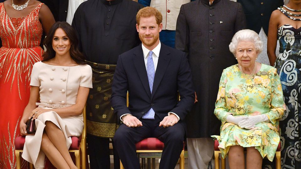 Herzogin Meghan, Prinz Harry und Queen Elizabeth II.