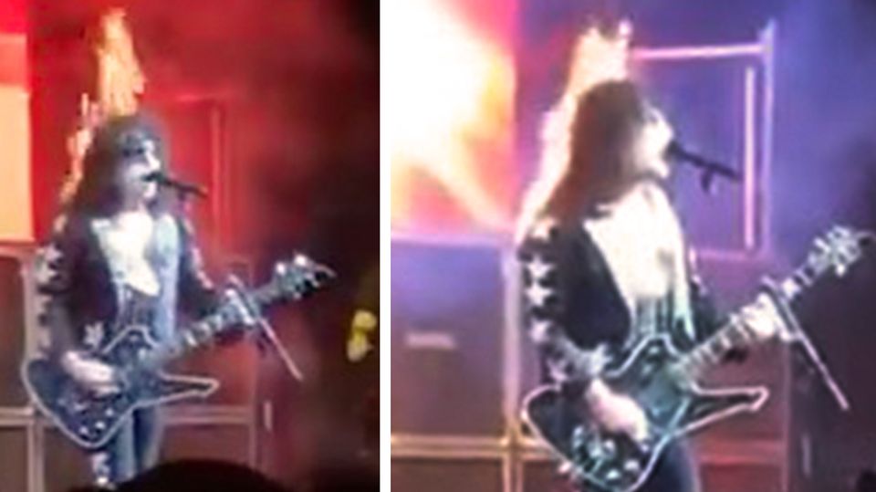 Sänger und Gitarrist Bobby Jensen von der "Kiss"-Coverband "Hairball" steht mit brennenden Haaren auf der Bühne.