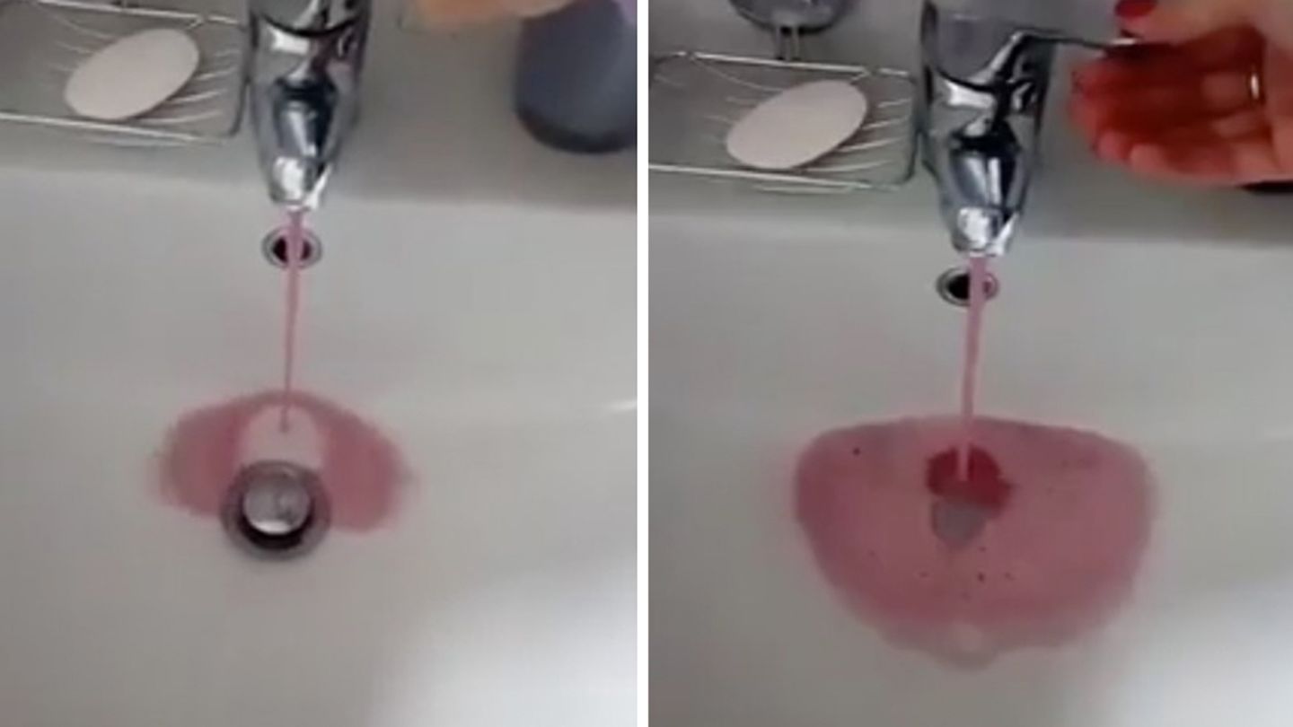 Aus einem Wasserhahn fließt Wein