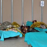 Patienten mit Rettungsdecken in Brescia