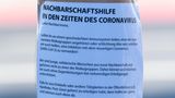 Von Besorgungen bis Gassi gehen: ein wasserfester Zettel mit einem Angebot für Nachbarschaftshilfe.