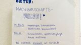 Angebot für Nachbarschaftshilfe an der Hauswand in Kiel: Während des Kontaktverbots sind in Schleswig-Holstein Treffen von mehr als zwei Menschen verboten.
