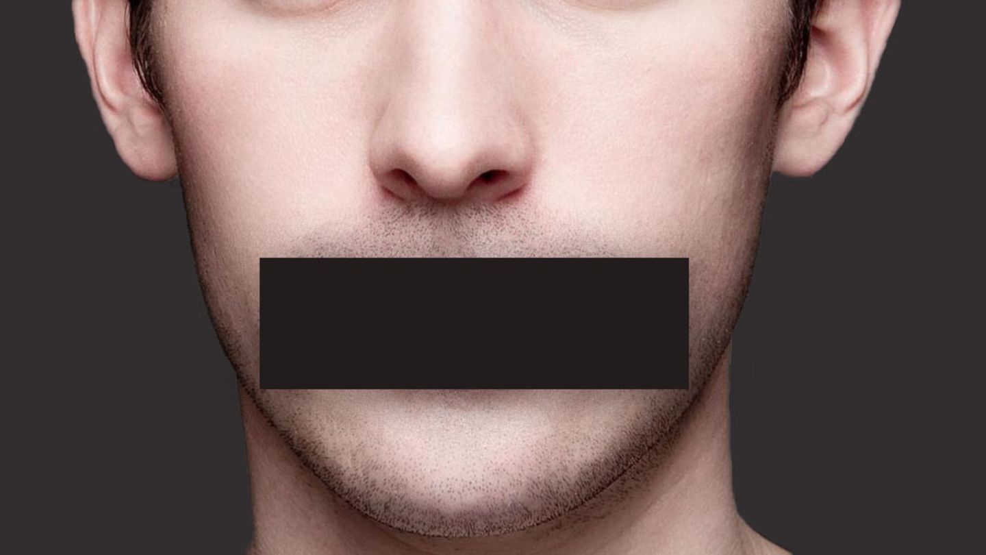 Eine Gesicht mit Balken vor dem Mund