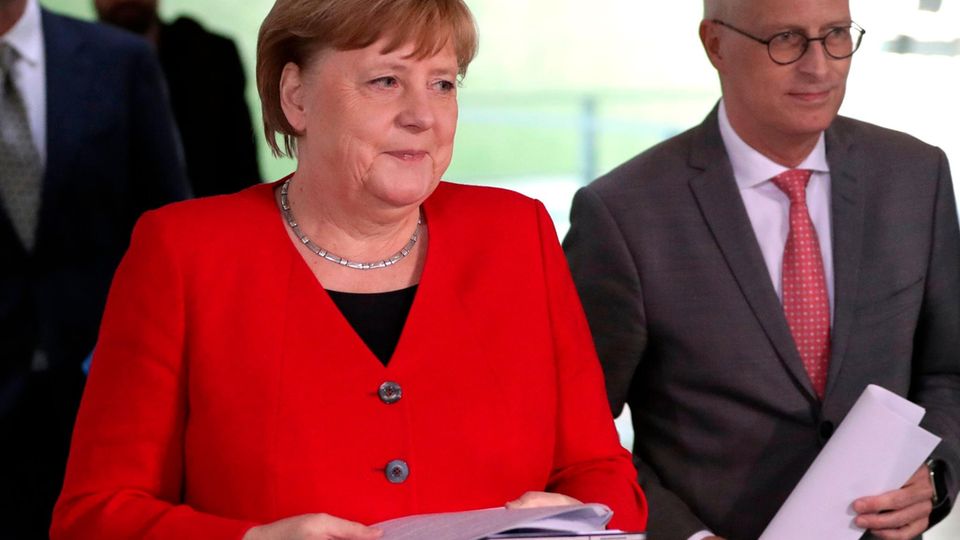 Angela Merkel und Peter Tschentscher