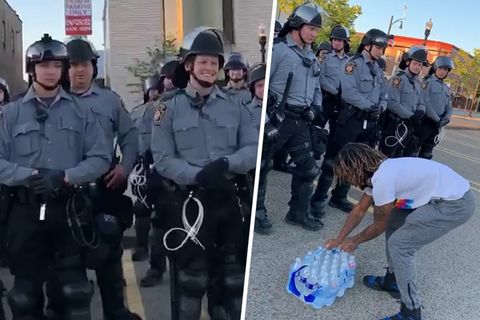Erfrischende Geste: US-Demonstrant versorgt Polizisten mit Wasser