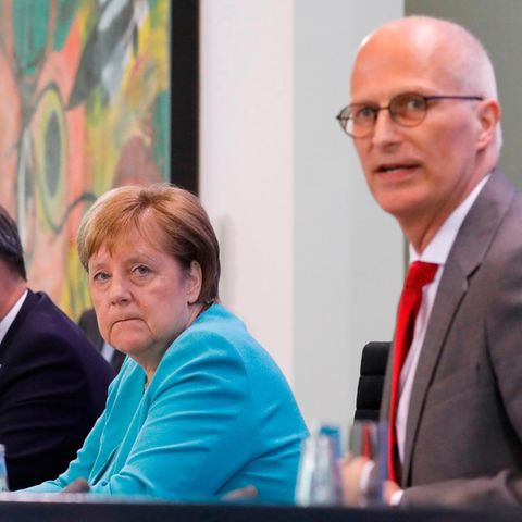 Markus Söder, Angela Merkel und Peter Tschentscher